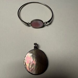Elegant Sterling Silver and Pink Pendant along with the matching bracelet.